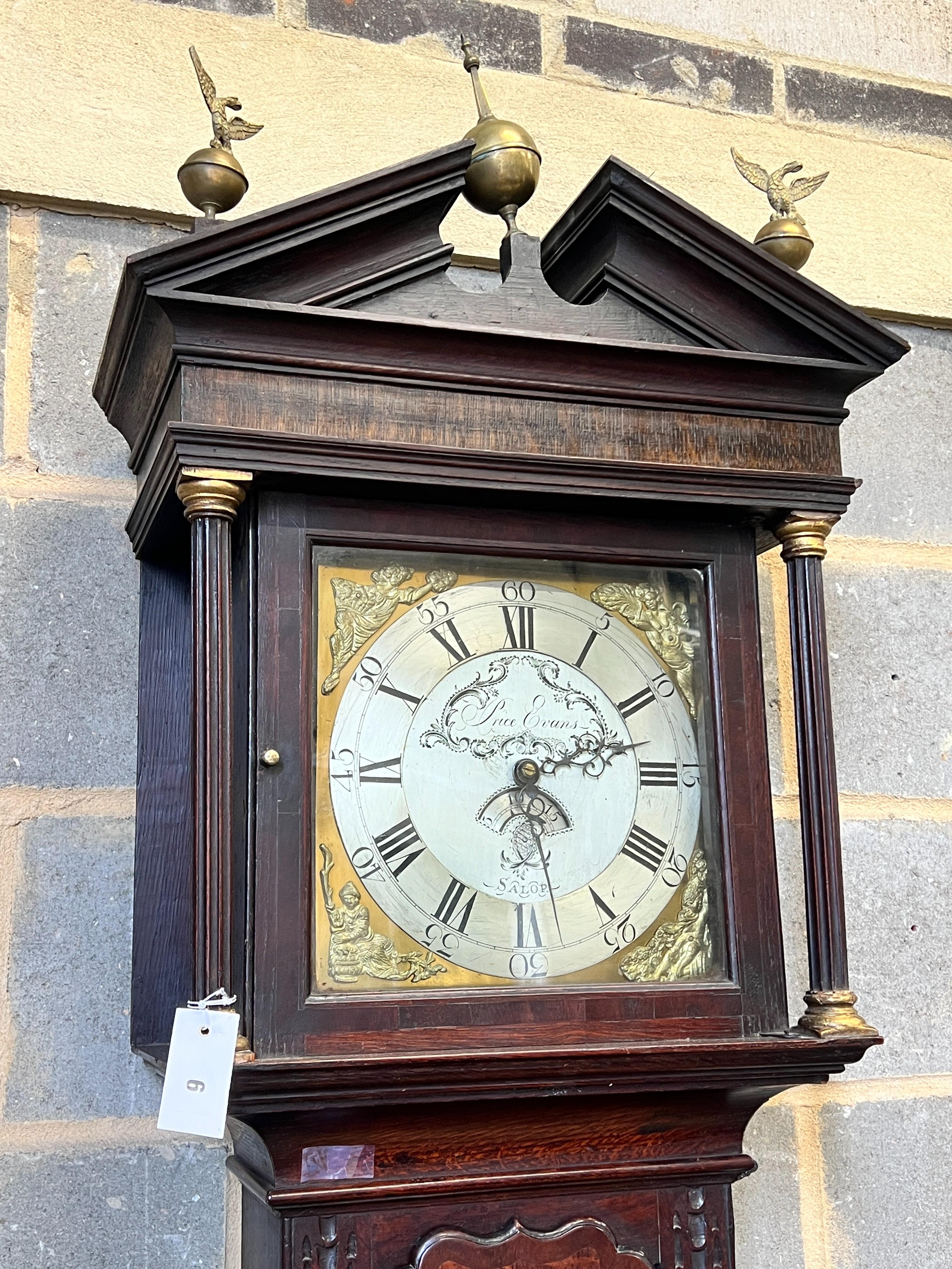 A George III later carved oak cased 30 hour longcase clock, marked Evans, Salop, height 234cm